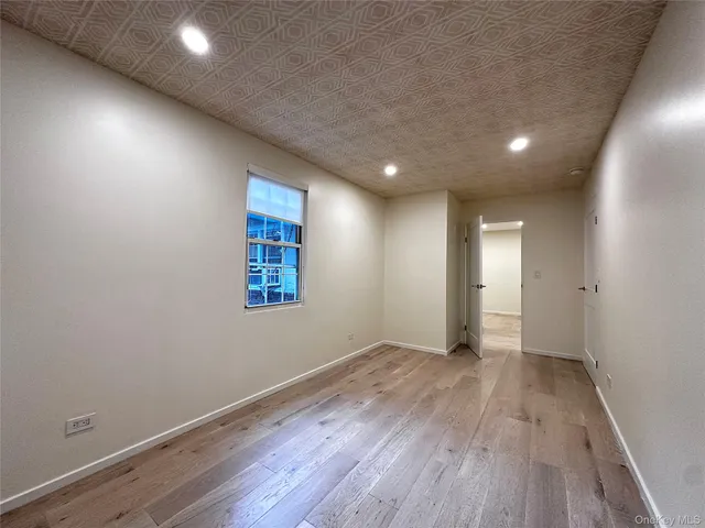 a view of staircase with white walls