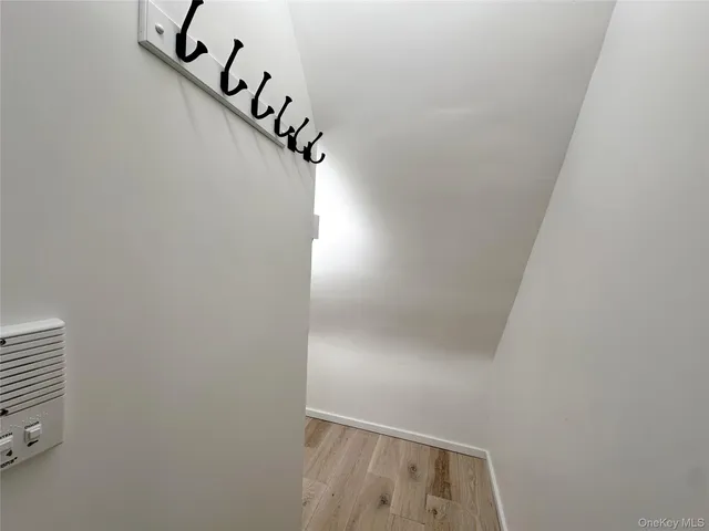 a utility room with sink dryer and washer