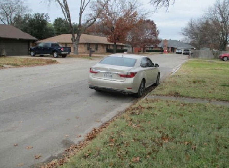 517 South Kirby Street Pilot Point, TX 76258 - Photo 5 of 6 a view of street with parked cars