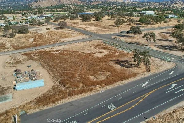 a view of a terrace with chairs and a table