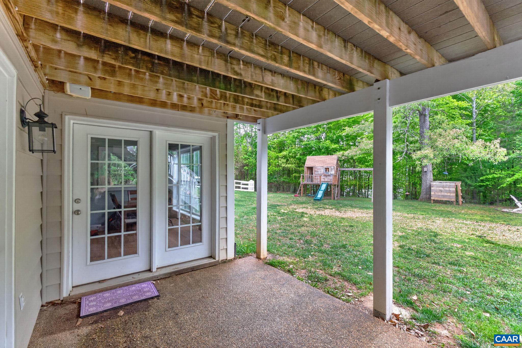 511 Taylor Ridge Way Palmyra, VA 22963 - Photo 43 of 57 a view of a porch with a backyard