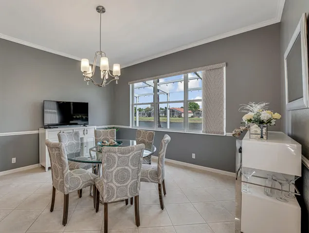 a bedroom with a large bed and a couch