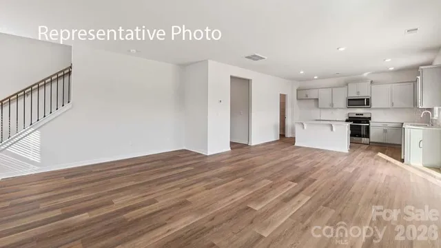a view of kitchen with wooden floor