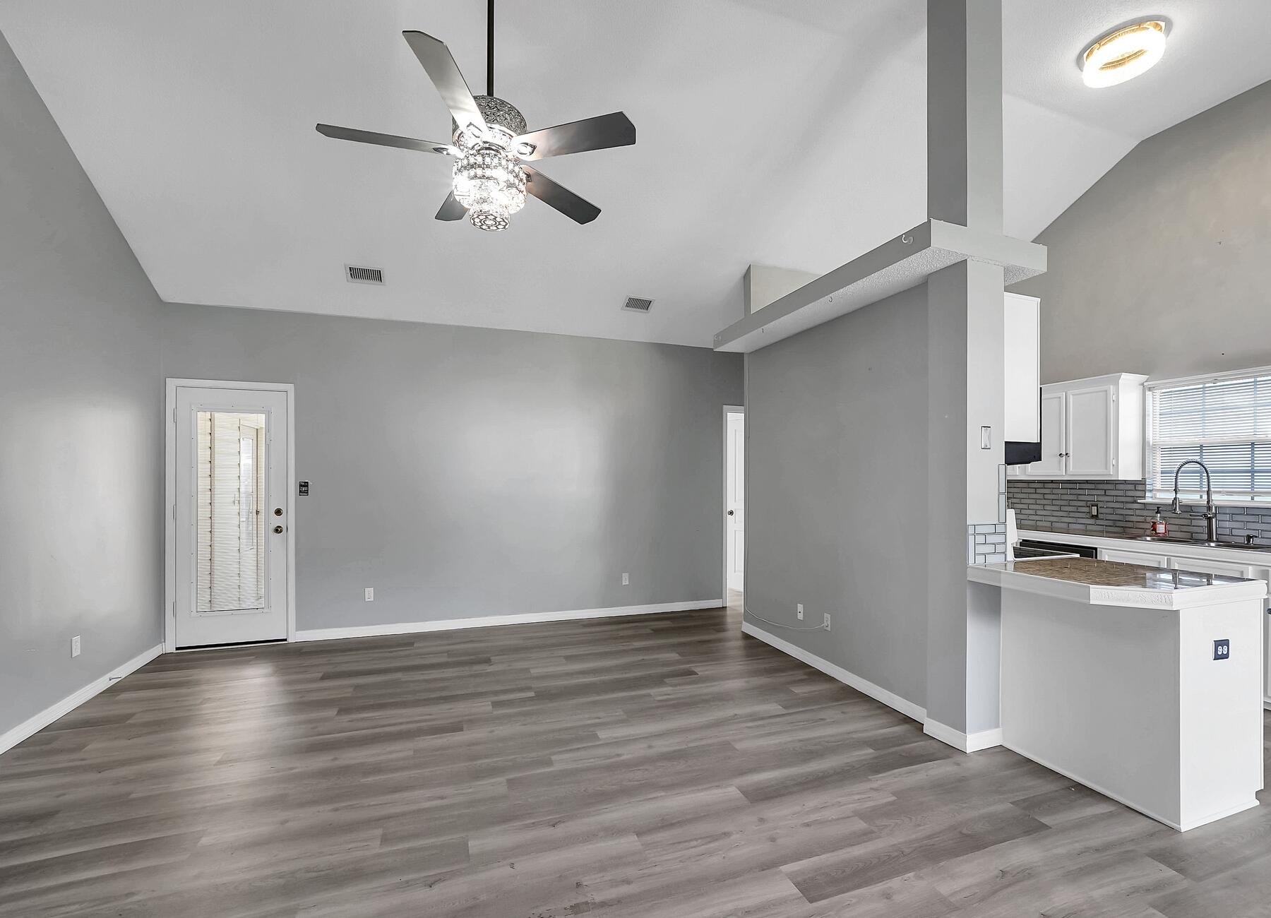 129 Wright Circle Niceville, FL 32578 - Photo 2 of 44 a view of a kitchen with a sink and dishwasher