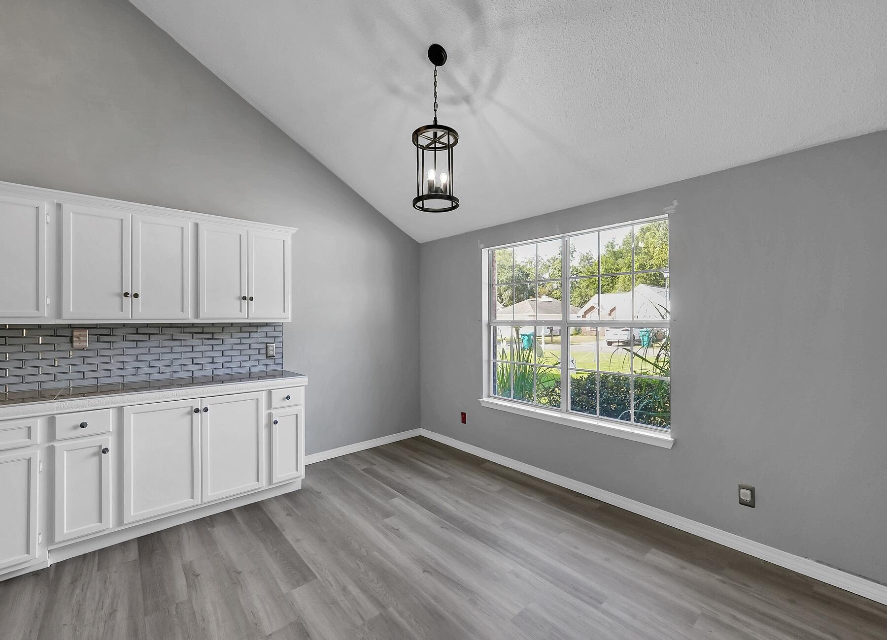 129 Wright Circle Niceville, FL 32578 - Photo 7 of 44 a view of an empty room with a window