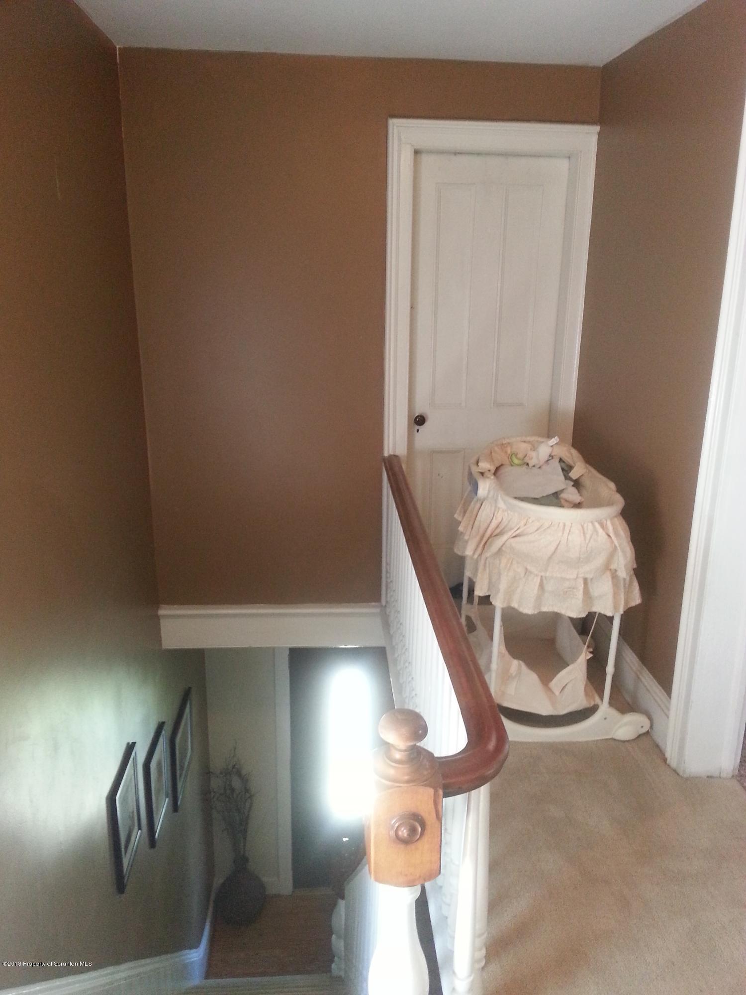 621 Electric Street Scranton, PA 18509 - Photo 24 of 29 a living room with furniture and a table