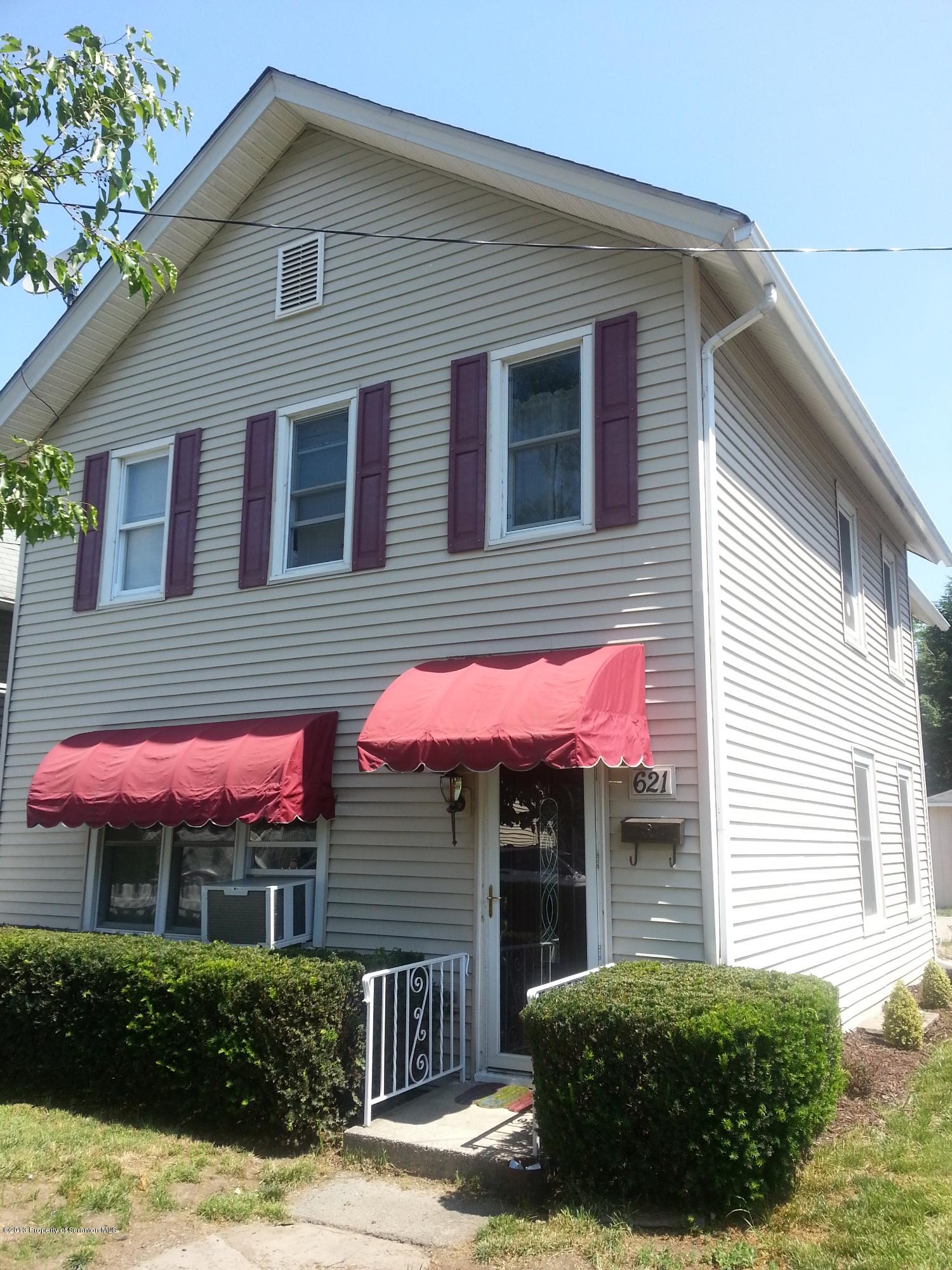 621 Electric Street Scranton, PA 18509 - Photo 4 of 29 a view of a house with a yard and potted plants