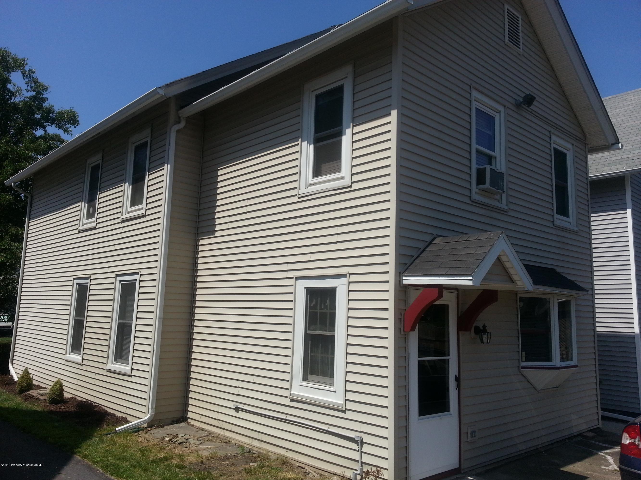 621 Electric Street Scranton, PA 18509 - Photo 6 of 29 a view of a house with a door and wooden walls
