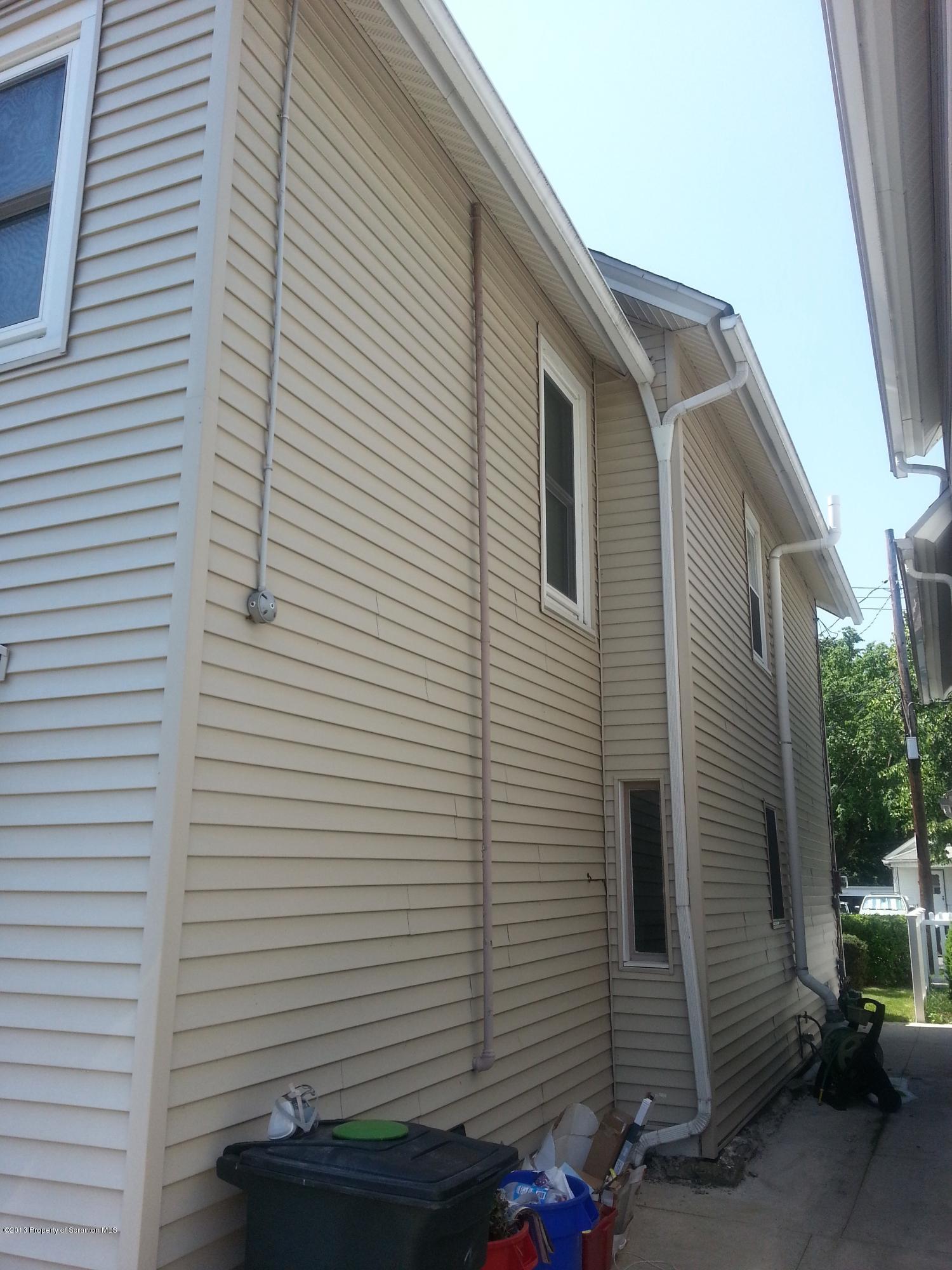 621 Electric Street Scranton, PA 18509 - Photo 7 of 29 a view of a house with a door