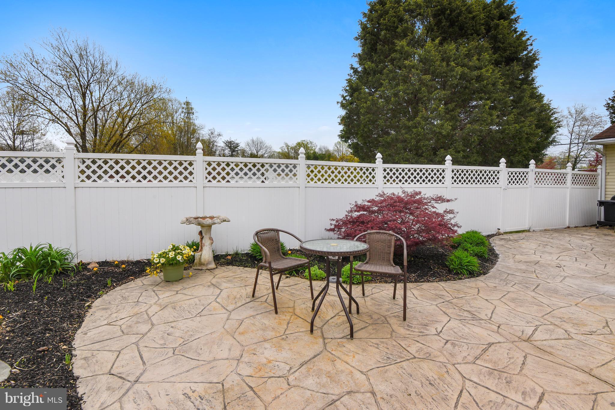 1319 Jones Station Road Arnold, MD 21012 - Photo 18 of 29 Stamped concrete patio surrounds pool area fenced