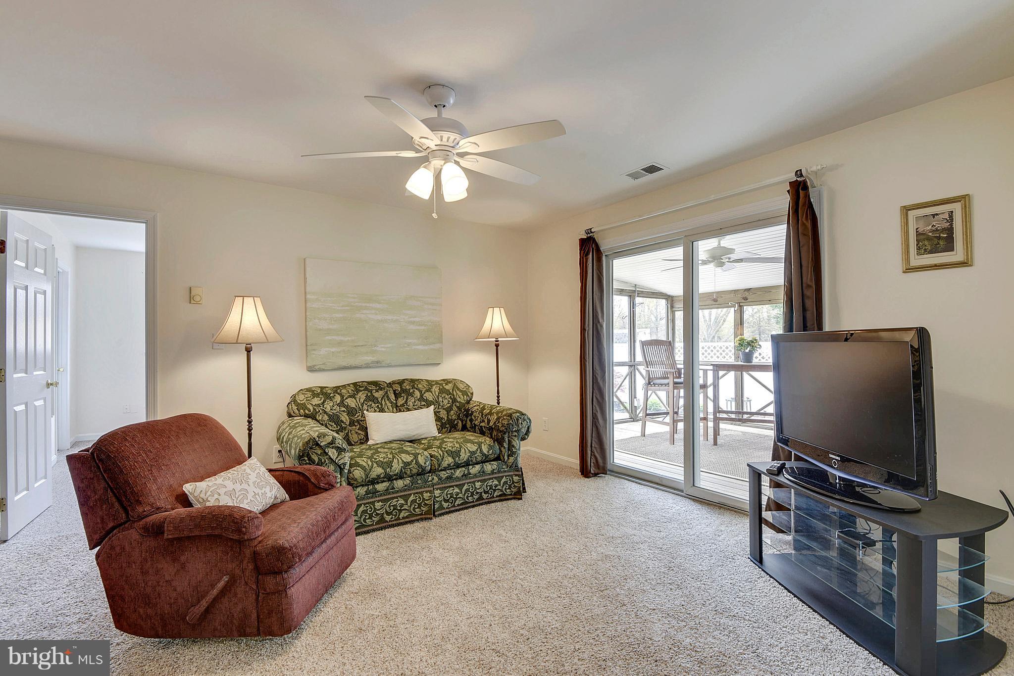 1319 Jones Station Road Arnold, MD 21012 - Photo 10 of 29 Gas fireplace makes for cozy reading corner