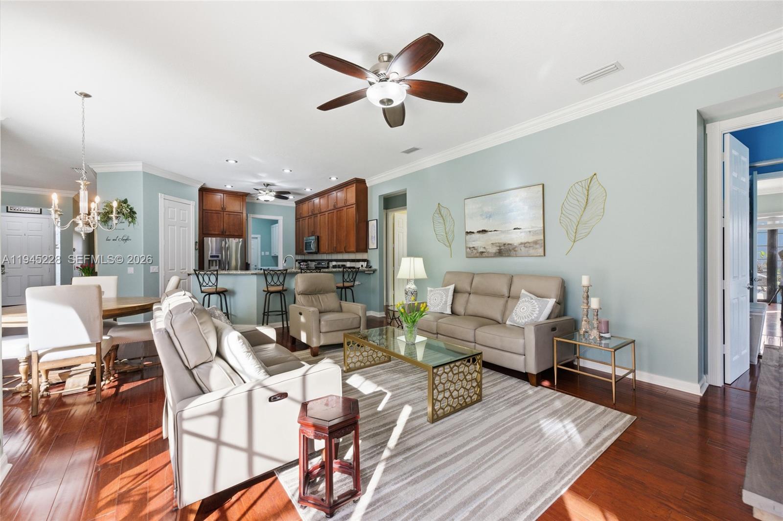7646 Red River Road West Palm Beach, FL 33411 - Photo 21 of 69 a living room with furniture and kitchen view