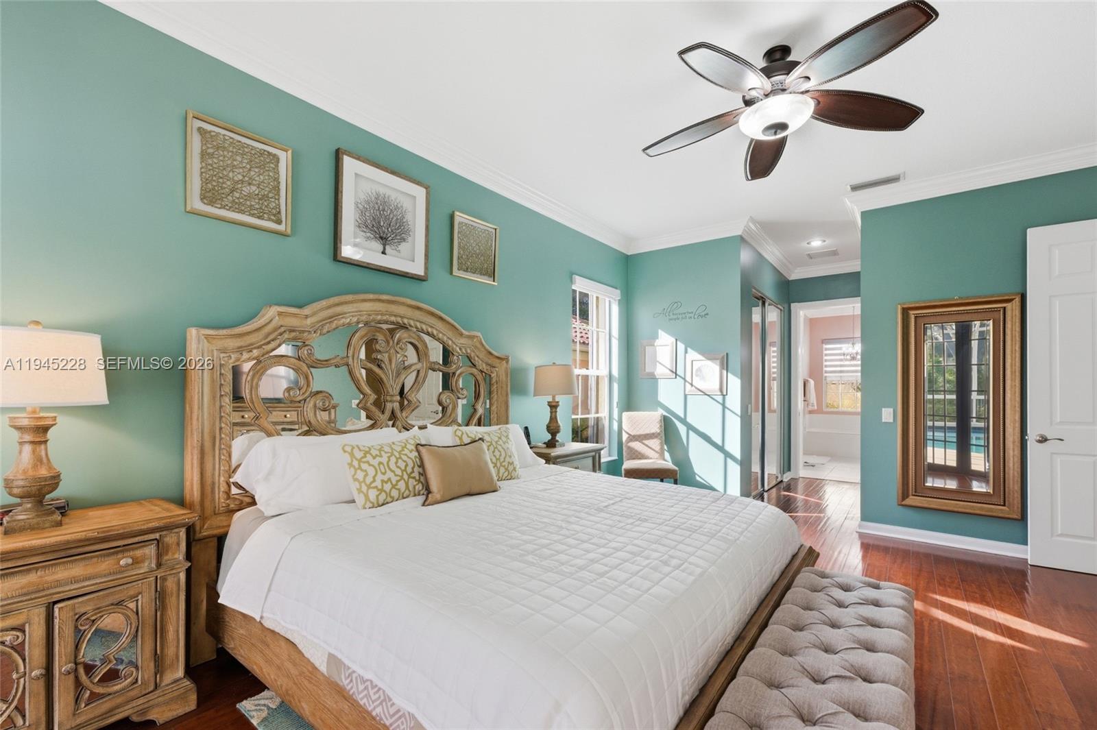 7646 Red River Road West Palm Beach, FL 33411 - Photo 27 of 69 a bedroom with a large bed and a window