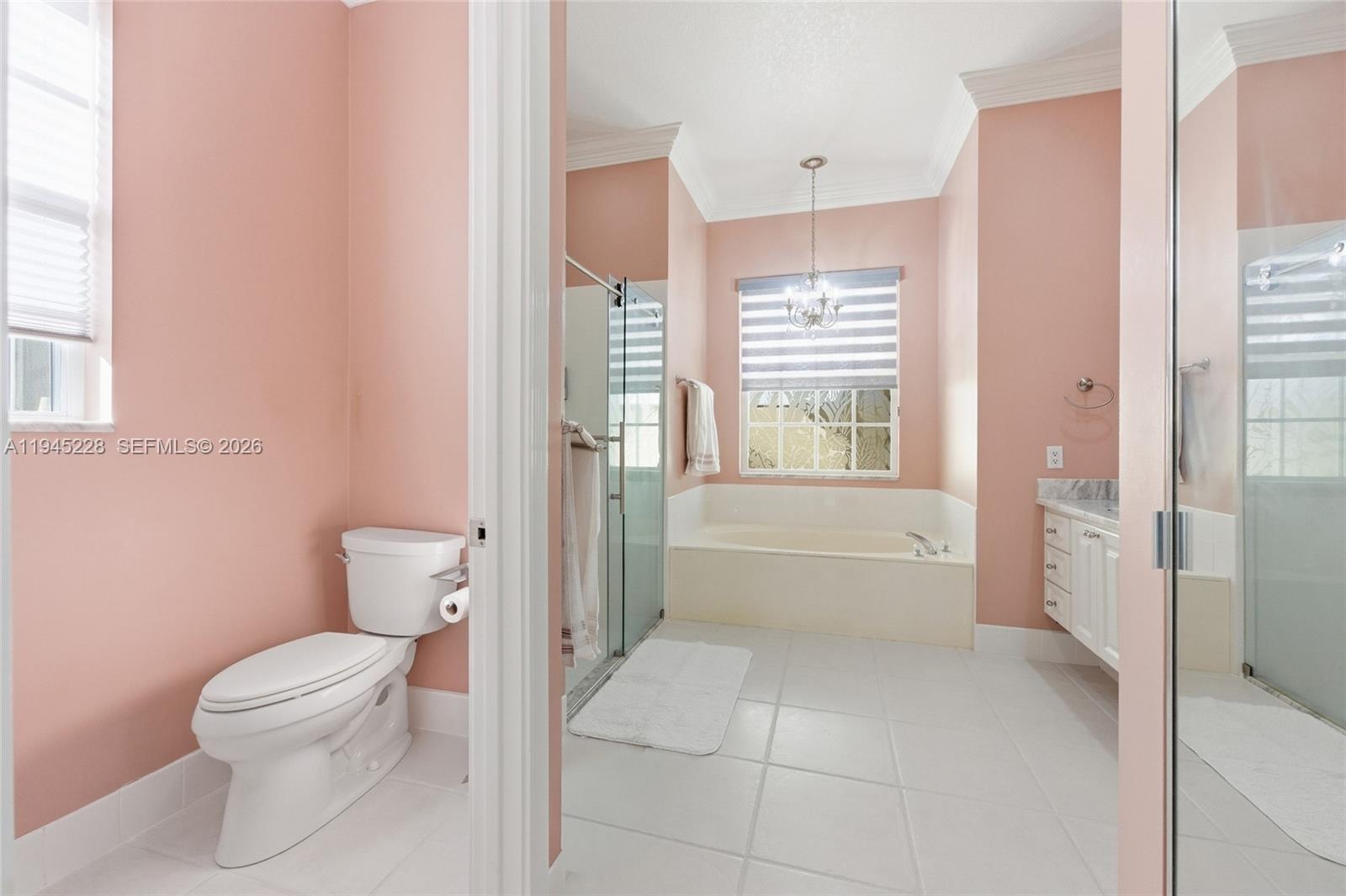 7646 Red River Road West Palm Beach, FL 33411 - Photo 34 of 69 a bathroom with a toilet a sink and bathtub