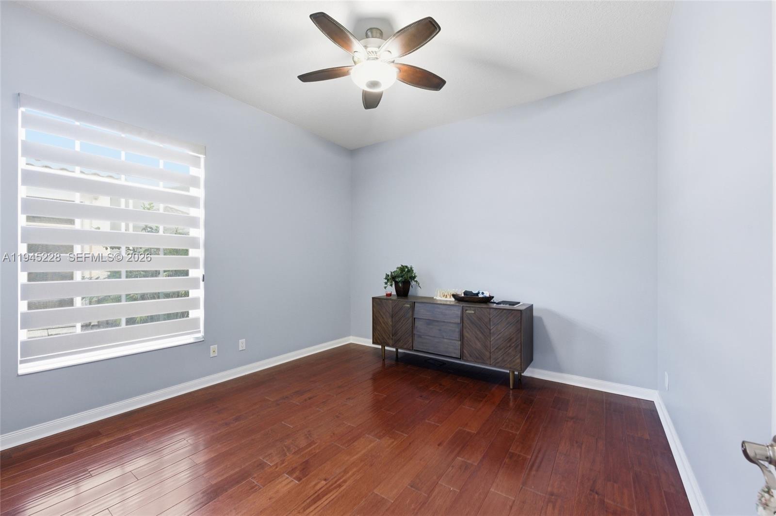 7646 Red River Road West Palm Beach, FL 33411 - Photo 39 of 69 a living room with furniture and a window