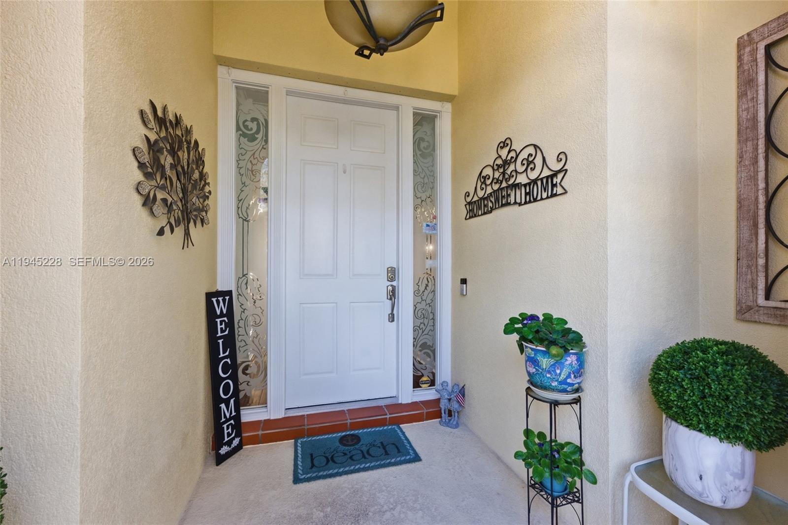 7646 Red River Road West Palm Beach, FL 33411 - Photo 6 of 69 a room with potted plant and a potted plant