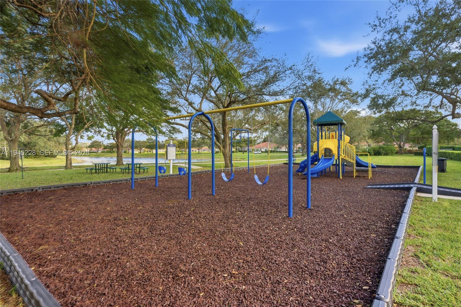 7646 Red River Road West Palm Beach, FL 33411 - Photo 63 of 69 a view of outdoor space with playground and green space