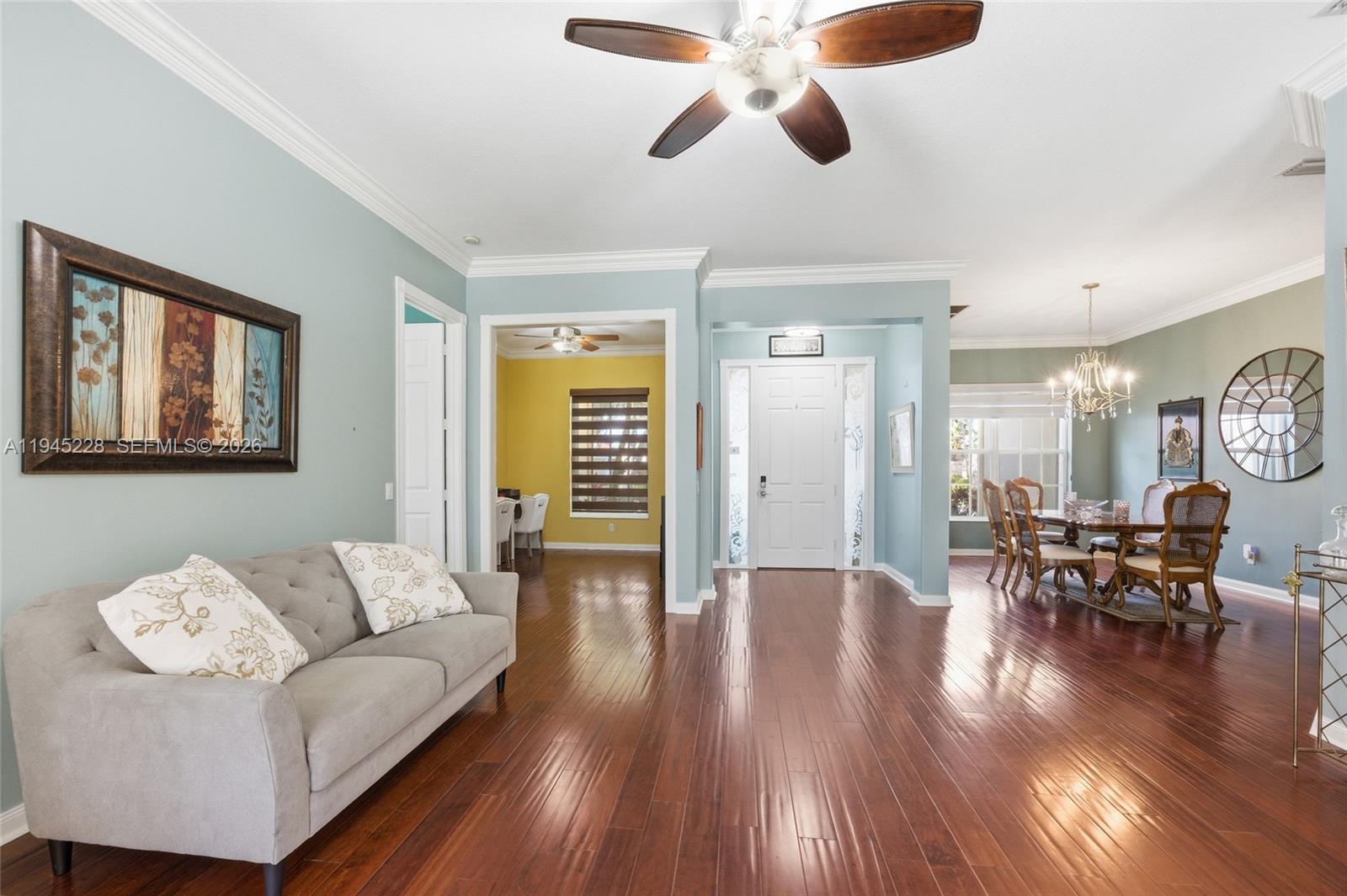 7646 Red River Road West Palm Beach, FL 33411 - Photo 10 of 69 a living room with furniture and a wooden floor