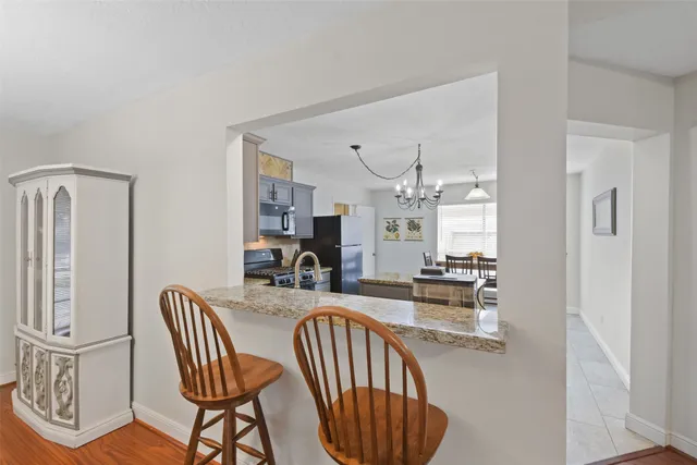 a view of a dining room with furniture