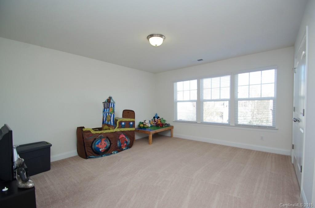 2001 Fallondale Road, Unit 919 Waxhaw, NC 28173 - Photo 14 of 24 wooden floor and windows in a room