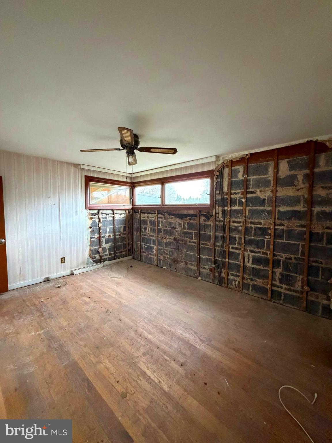 9610 Dedaker Street Philadelphia, PA 19115 - Photo 13 of 22 a view of an empty room with windows