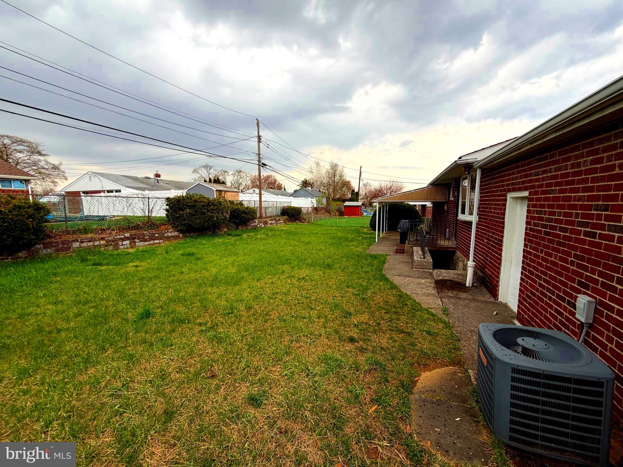 9610 Dedaker Street Philadelphia, PA 19115 - Photo 22 of 22 a view of a porch with furniture and a yard