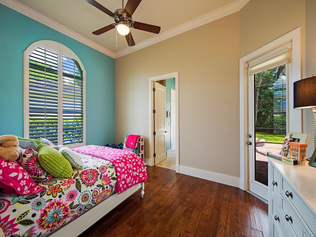 59 Myrtle Road Naples, FL 34108 - Photo 17 of 25 Guest suite on 1st floor with full bath and direct access to pool and lanai