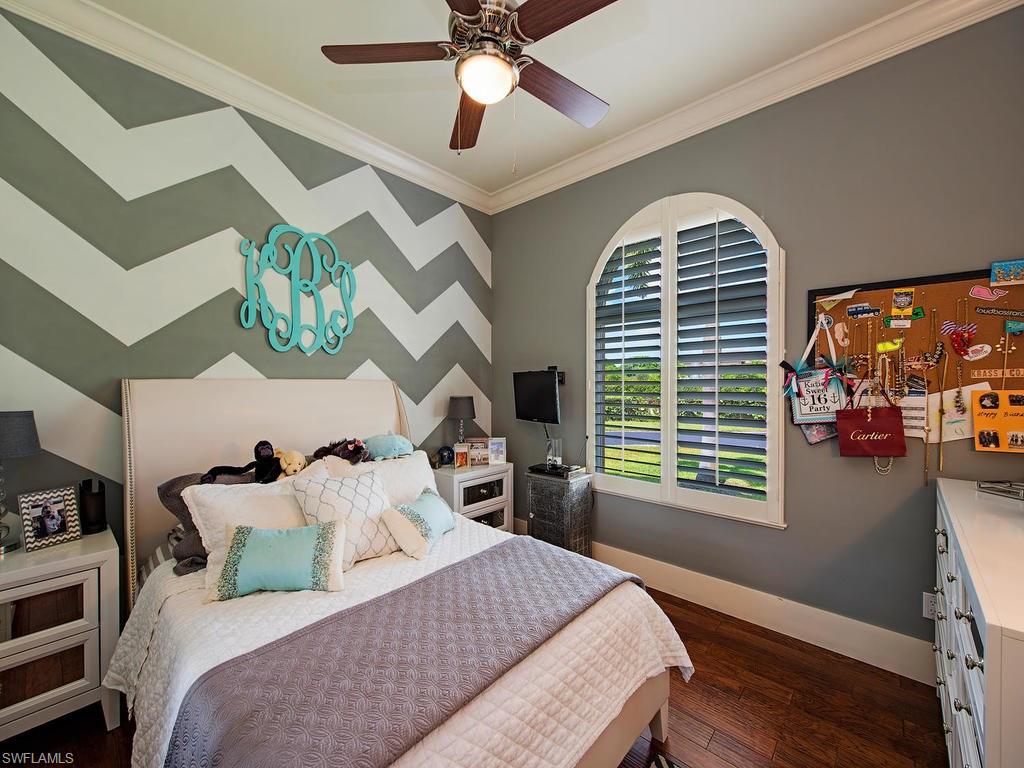 59 Myrtle Road Naples, FL 34108 - Photo 19 of 25 1st floor Bedroom 4 enjoys direct access to shared en-suite full bath