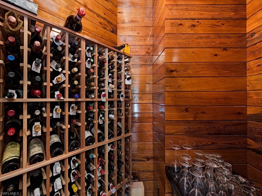 59 Myrtle Road Naples, FL 34108 - Photo 5 of 25 Fabulous wood-clad wine room