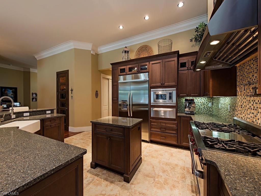 59 Myrtle Road Naples, FL 34108 - Photo 6 of 25 Large kitchen with 48" Wolf range, pot filler above, warming drawer & tons of pantry space