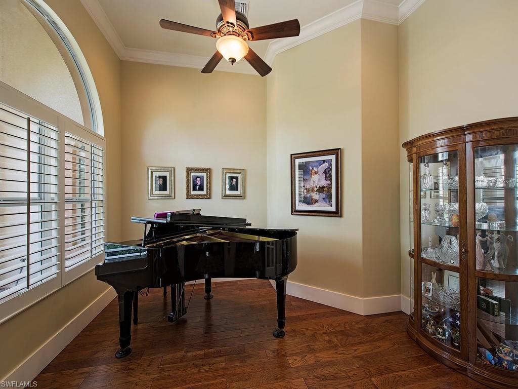 59 Myrtle Road Naples, FL 34108 - Photo 7 of 25 Sun-filled music/living room with French doors