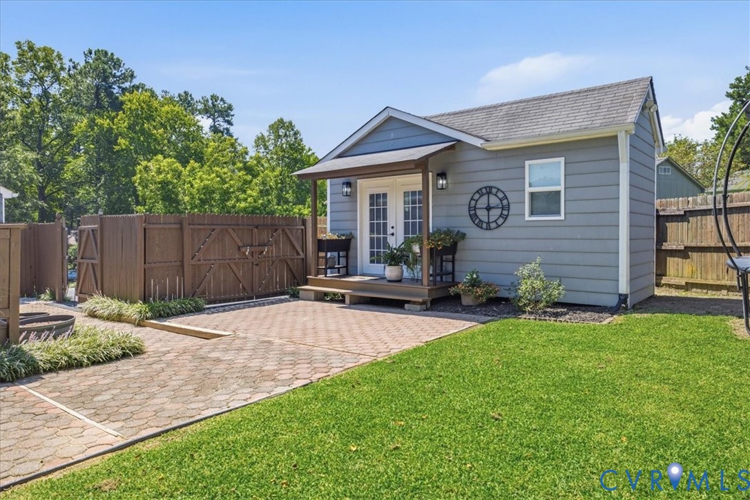 7900 Valencia Road Chesterfield, VA 23832 - Photo 28 of 37 Gray siding exterior with white trim, a gabled roo