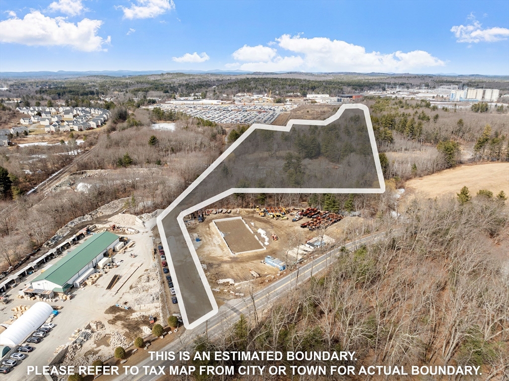 4 Spectacle Pond Road Littleton, MA 01460 - Photo 1 of 14 a view of an ocean beach