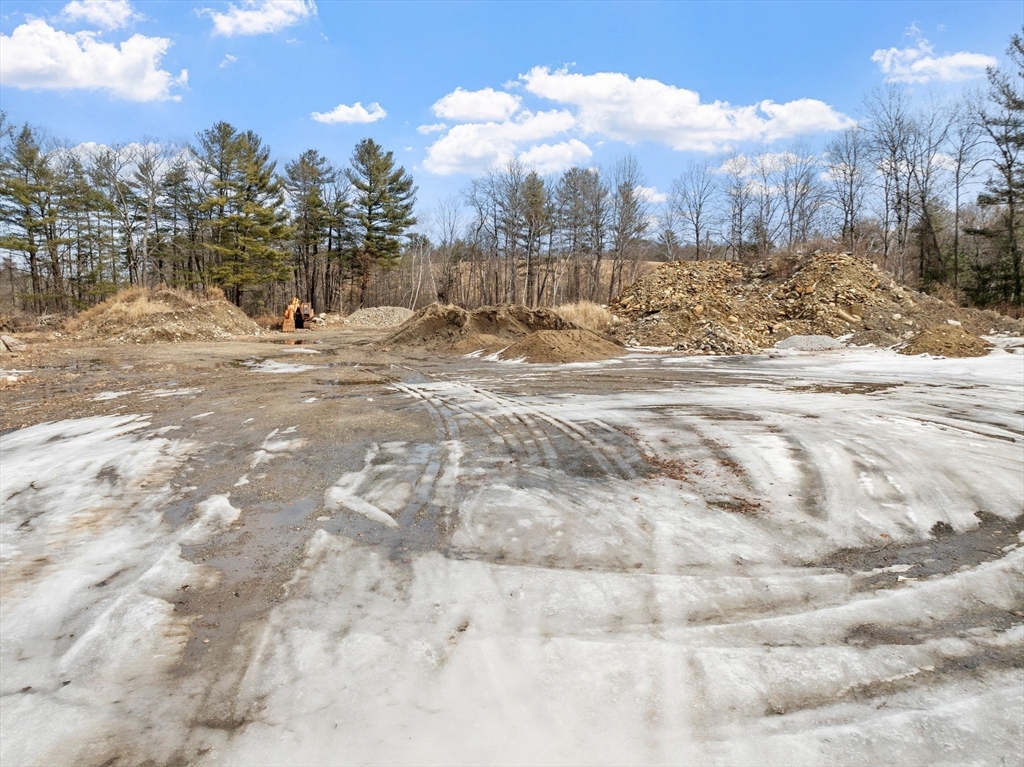 4 Spectacle Pond Road Littleton, MA 01460 - Photo 3 of 14 a view of a snow in the yard