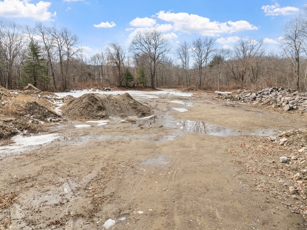 4 Spectacle Pond Road Littleton, MA 01460 - Photo 4 of 14 a view of snow on the side of a road