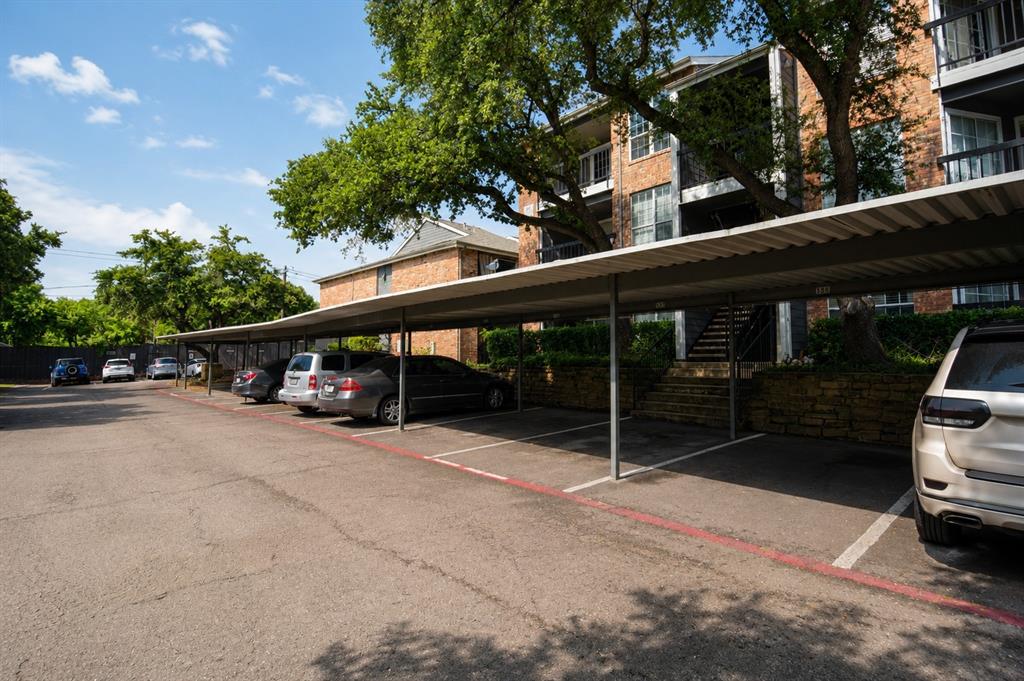 18333 Roehampton Drive, Unit 1036 Dallas, TX 75252 - Photo 11 of 12 Covered parking area featuring multiple carports