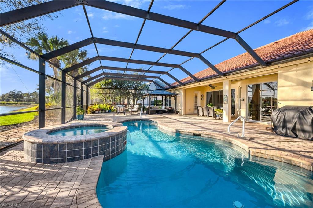 12080 Wicklow Lane Naples, FL 34120 - Photo 11 of 36 Screened Lanai with pool and spa