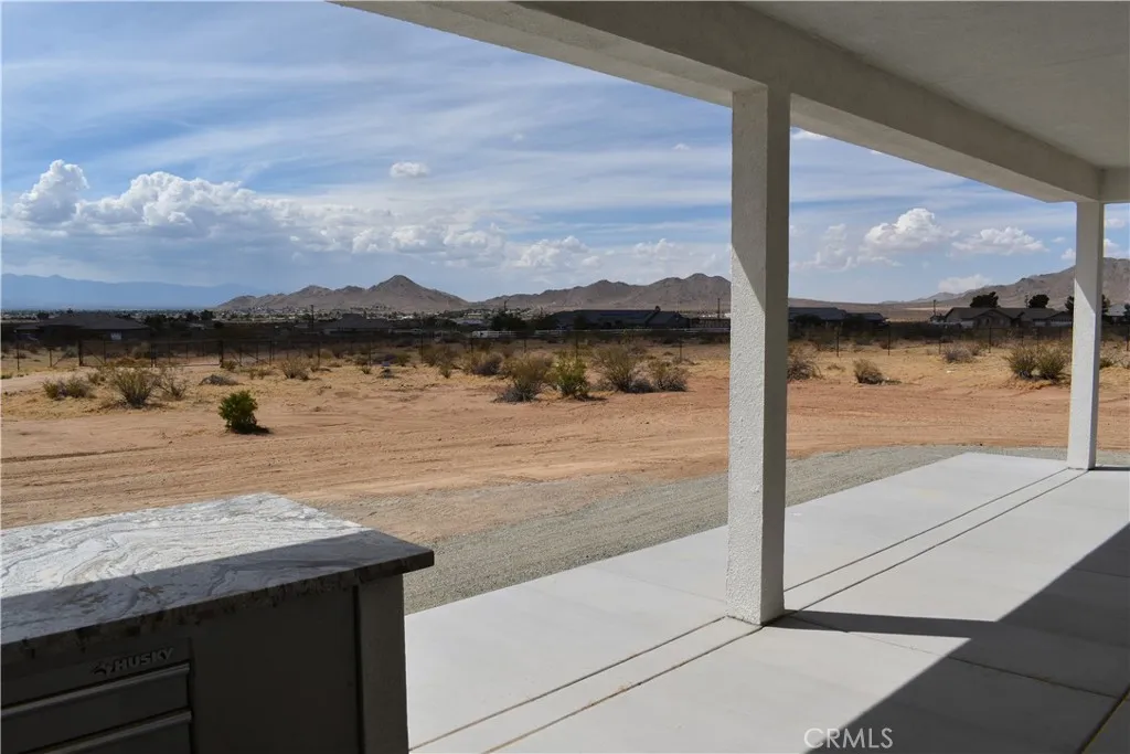 16944 Pauhaska Road Apple Valley, CA 92308 - Photo 44 of 74 a view of a lake from a balcony