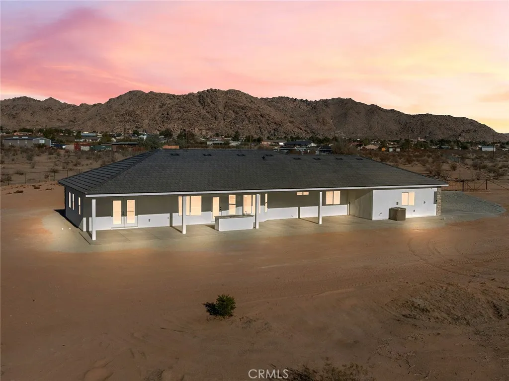 16944 Pauhaska Road Apple Valley, CA 92308 - Photo 52 of 74 a view of a lake with a mountain in the background