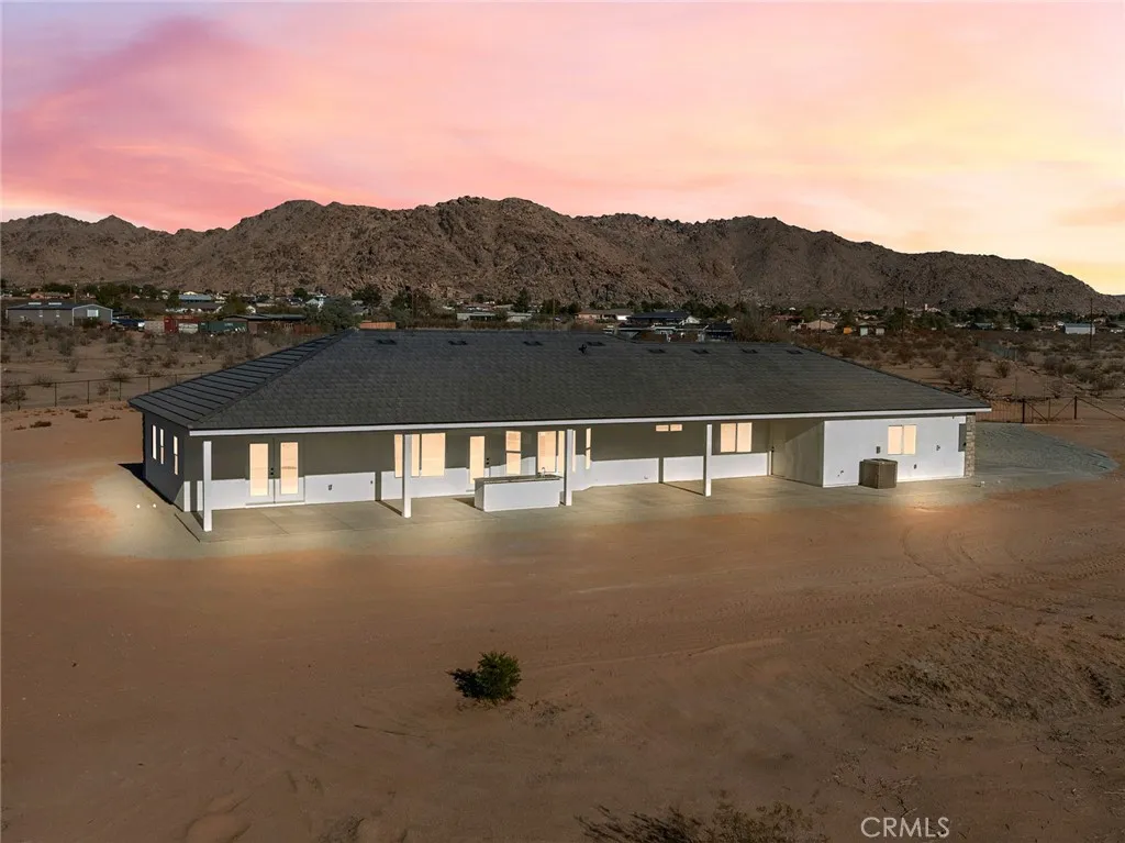 16944 Pauhaska Road Apple Valley, CA 92308 - Photo 66 of 74 a view of a lake with a mountain in the background