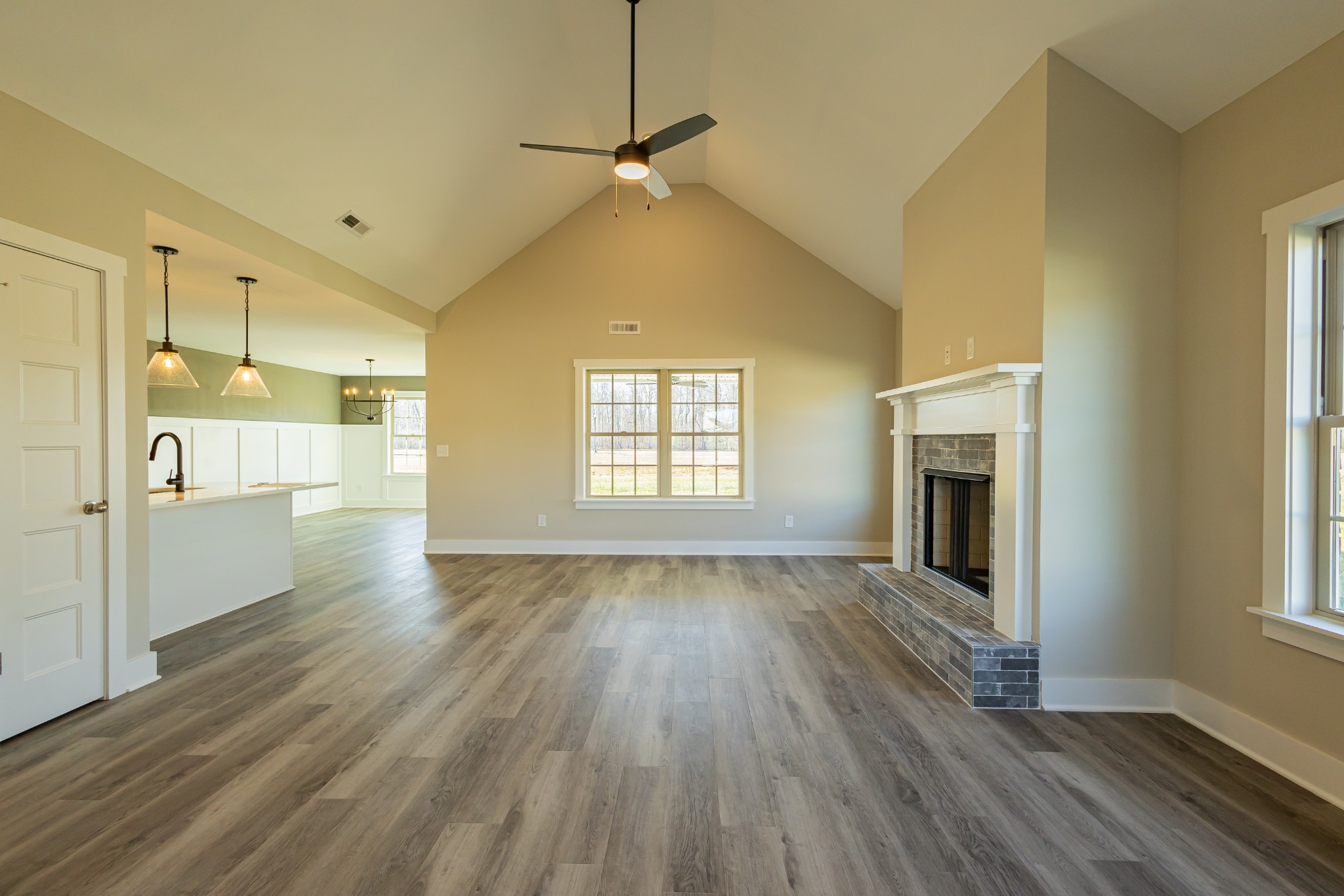 58 Brooklyn Avenue Manchester, TN 37355 - Photo 21 of 62 a view of an empty room with window and wooden floor