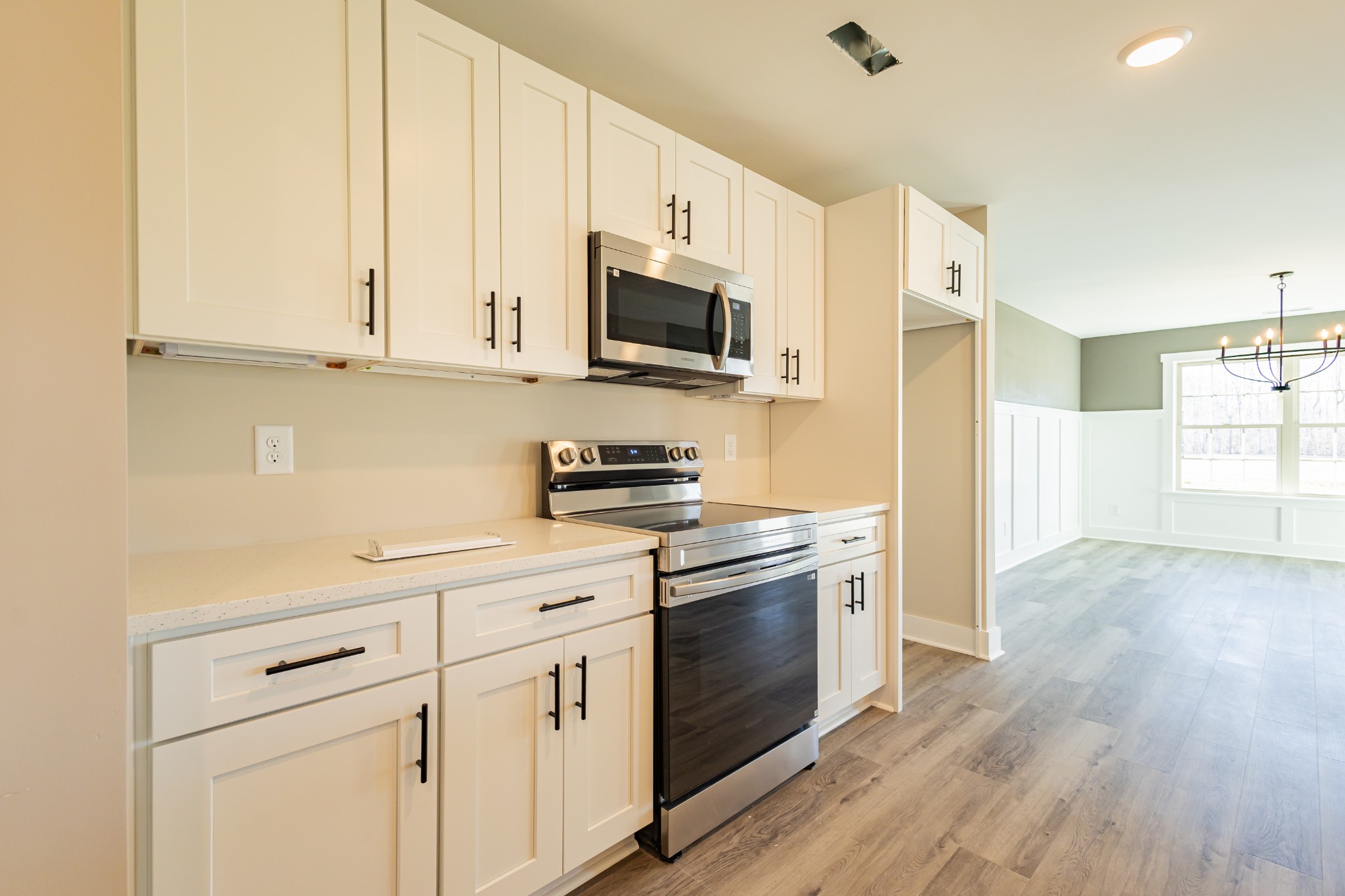 58 Brooklyn Avenue Manchester, TN 37355 - Photo 23 of 62 a kitchen with stainless steel appliances granite countertop a stove a sink and a refrigerator