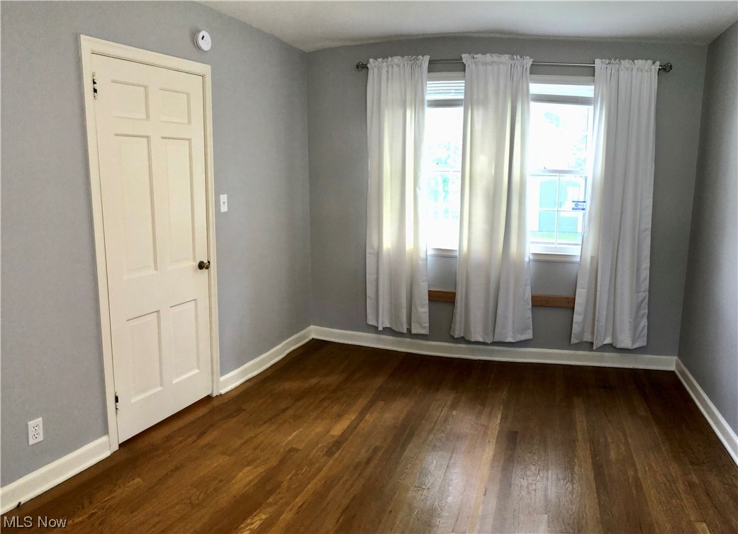 1246 Garman Road Akron, OH 44313 - Photo 15 of 22 Empty room featuring hardwood flooring