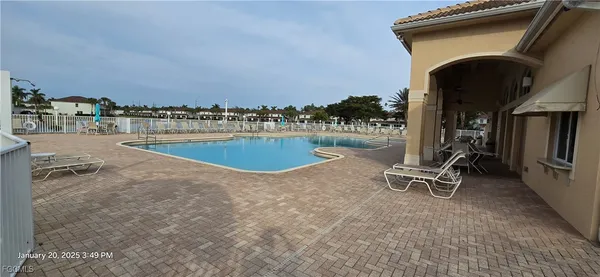 a view of a terrace with sitting area
