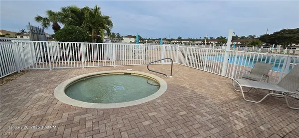 a view of a yard with furniture and a slide