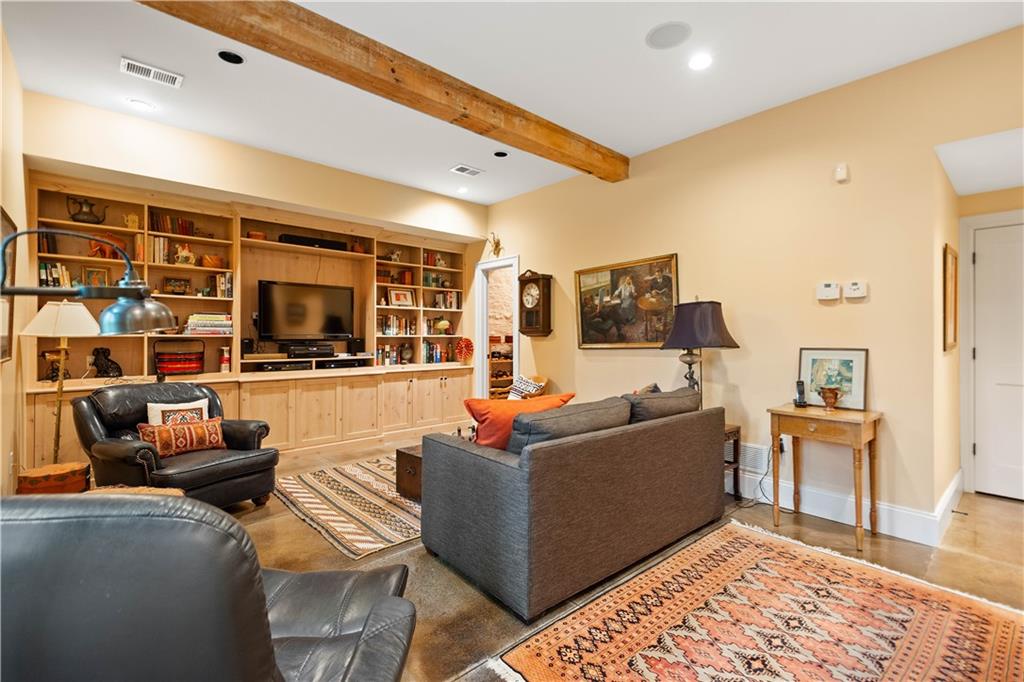 739 Chestnut Road Sewickley, PA 15143 - Photo 29 of 45 Built-in cabinets and concrete floors with radiant heat. There is a half bath adjacent.