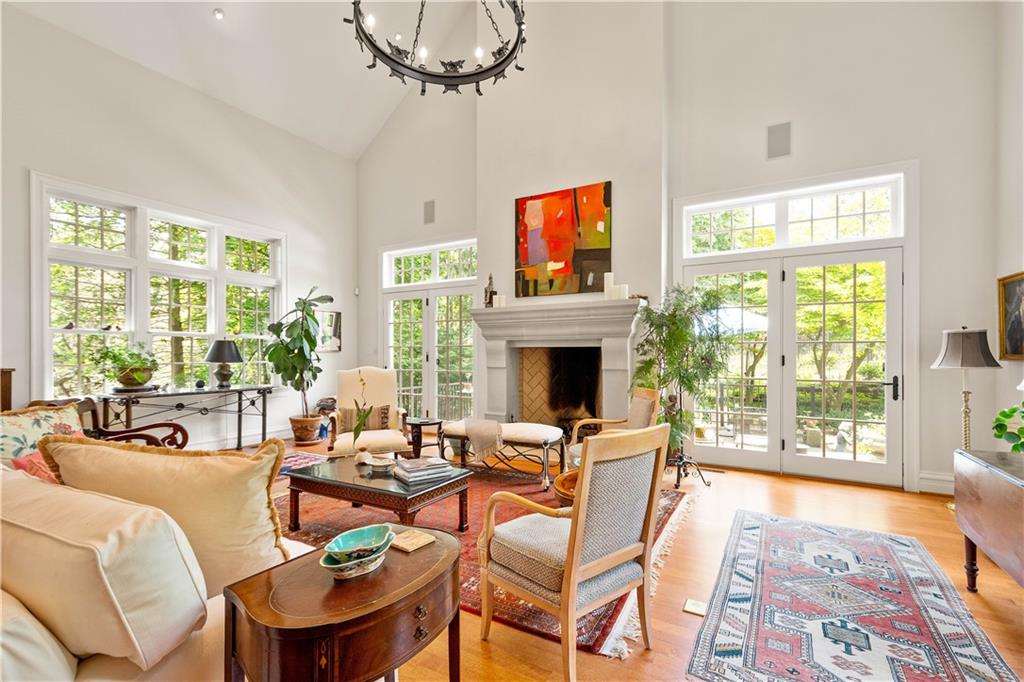 739 Chestnut Road Sewickley, PA 15143 - Photo 6 of 45 The Living room features high ceilings and 2 sets of French doors to the stone patio.