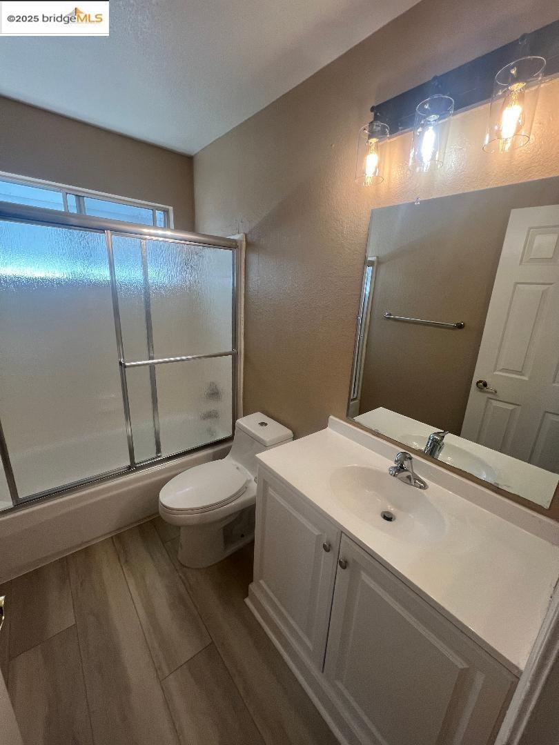 5016 Perry Way Antioch, CA 94531 - Photo 11 of 16 a bathroom with a sink a toilet and shower