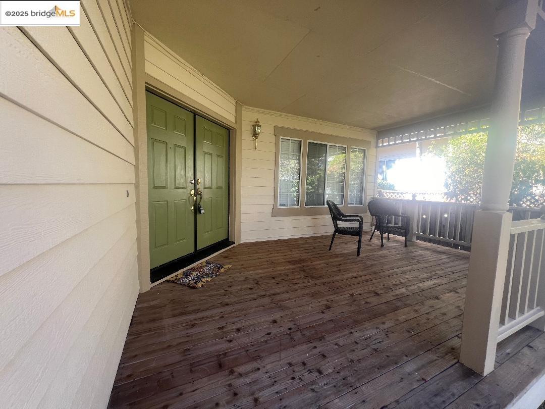 5016 Perry Way Antioch, CA 94531 - Photo 2 of 16 a view of a livingroom with wooden floor and furniture