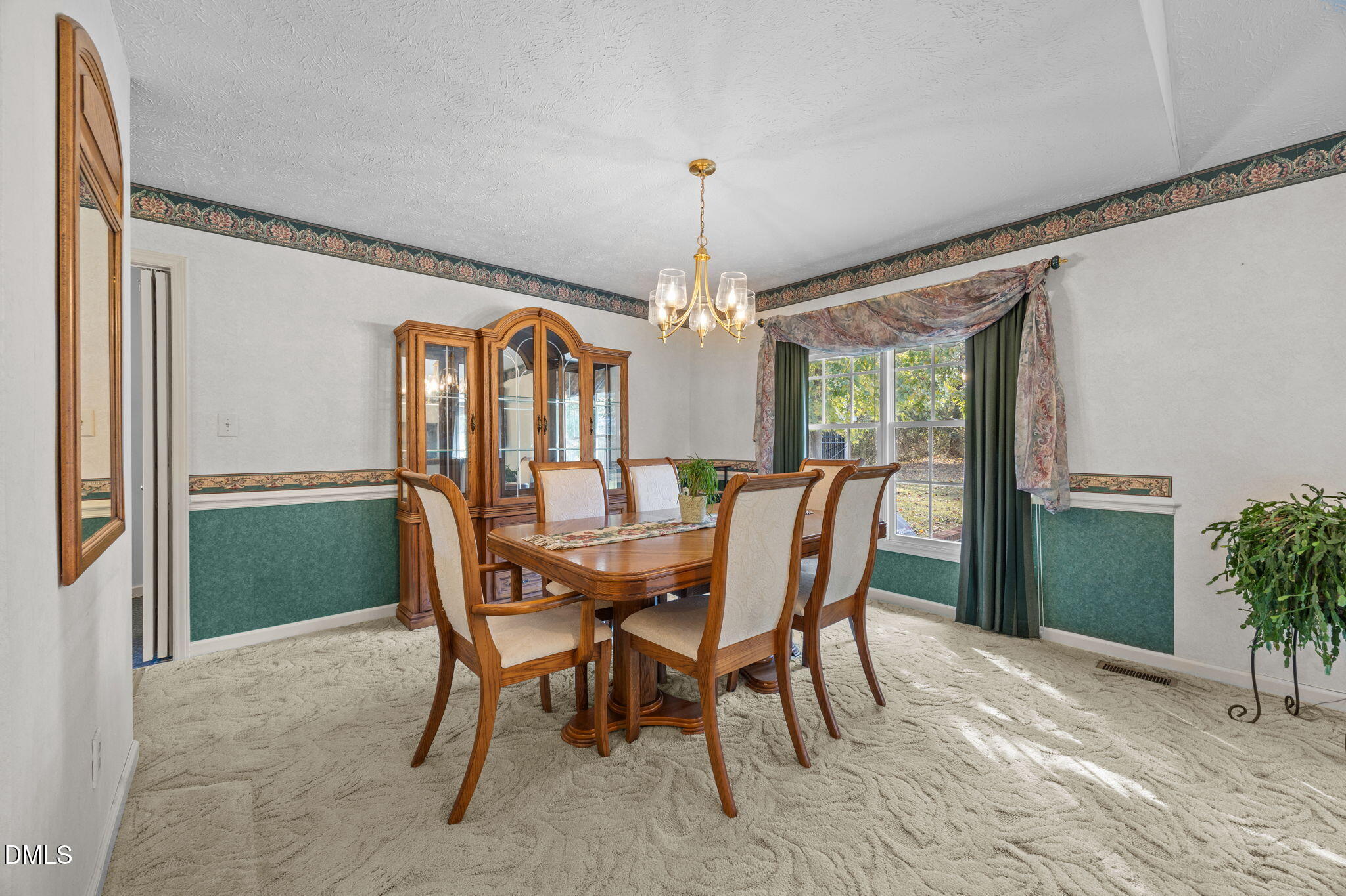 69 Deer Run Court Angier, NC 27501 - Photo 10 of 40 a dining room with furniture window and wooden floor